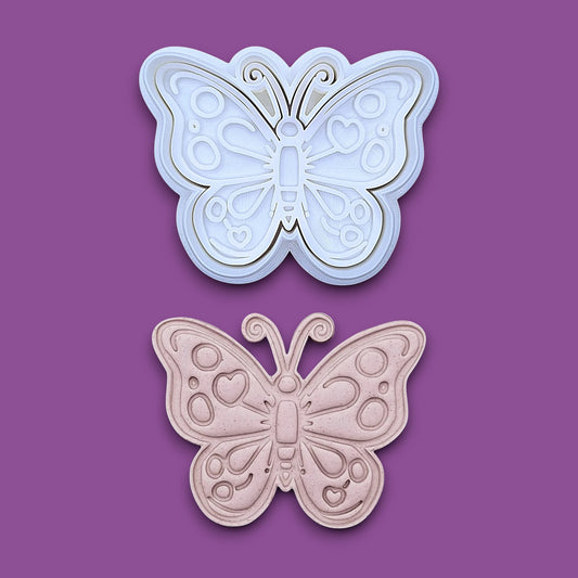 Handmade and customizable butterfly cookie cutter stamp and dough cutout and imprint, perfect for spring baking, garden party treats, birthdays, events, weddings, fondant decorations, and whimsical cookie designs.