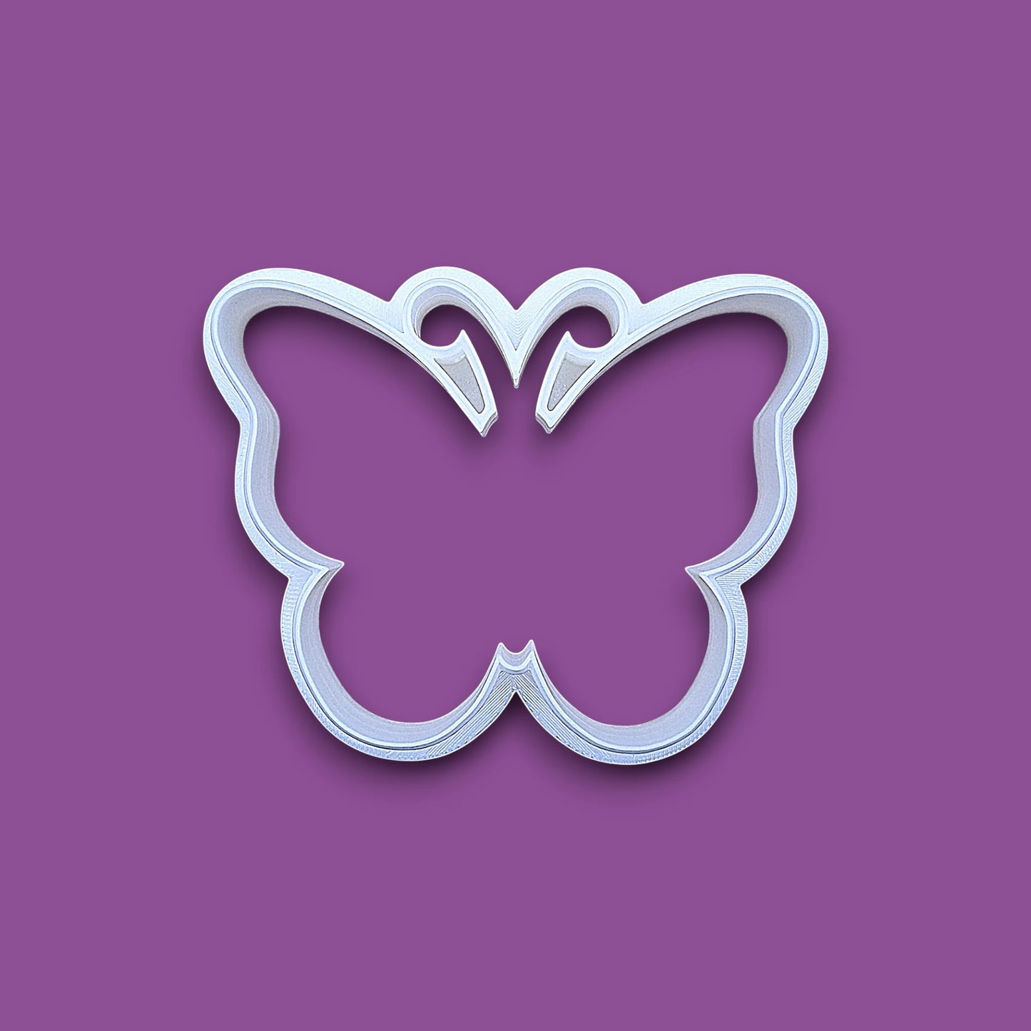 Handmade and customizable butterfly cookie cutter, perfect for spring baking, garden party treats, birthdays, events, weddings, fondant decorations, and whimsical cookie designs.