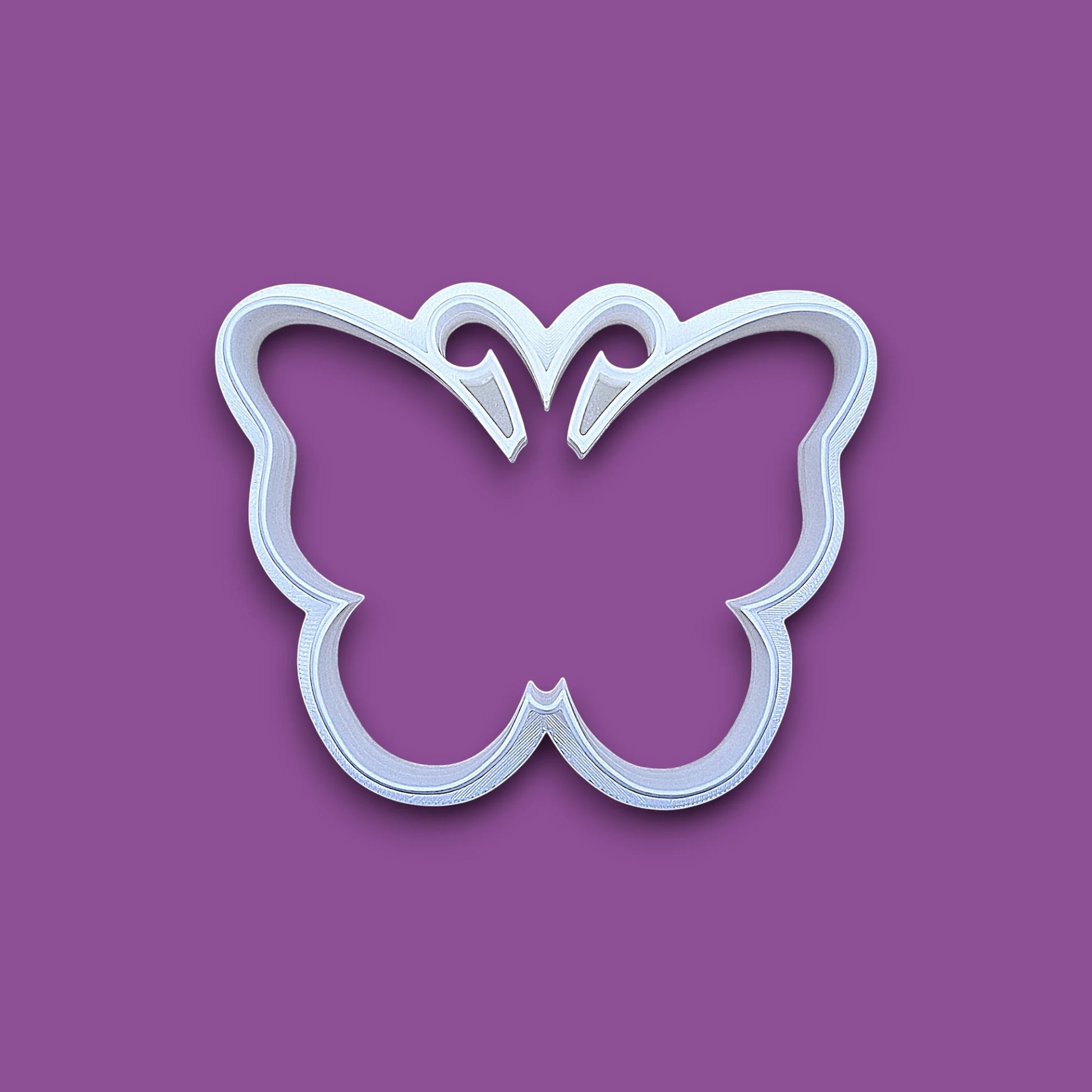 Handmade and customizable butterfly cookie cutter, perfect for spring baking, garden party treats, birthdays, events, weddings, fondant decorations, and whimsical cookie designs.