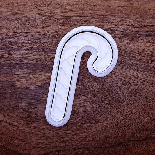 Candy Cane Cookie Cutter with optional stamp for holiday baking. Create festive striped cookies for Christmas parties, bake sales, or family traditions.