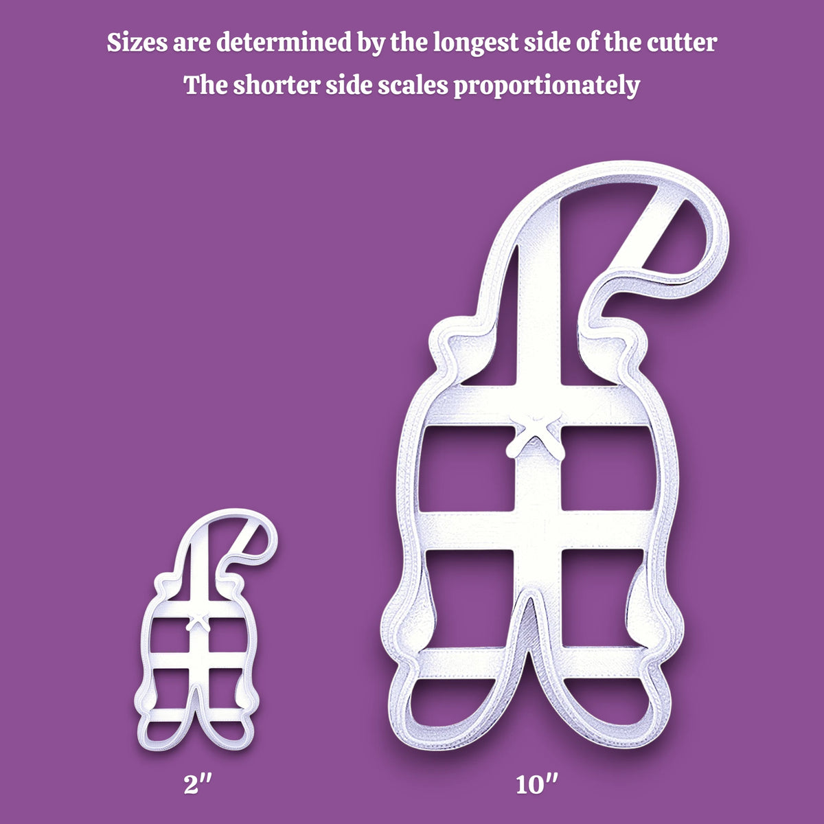 A purple informational graphic showing two cat butt cookie cutters, one small labeled 2 inches and one larger labeled 10 inches, with text at the top explaining that sizes are determined by the longest side of the cutter and the shorter side scales proportionately.