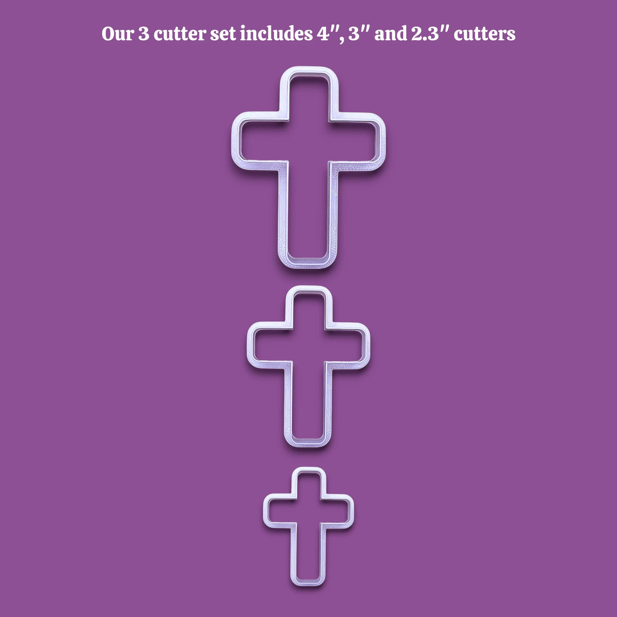 Three cross-shaped cookie cutters in descending sizes arranged vertically on a solid purple background, with white text at the top reading 'Our 3 cutter set includes 4", 3" and 2.3" cutters'.
