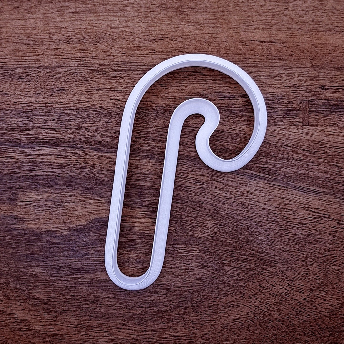 Holiday Candy Cane Cookie Cutter available in 1.5" to 7". Optional stamp adds stripe details for Christmas cookies, gifts, and fun family baking activities.