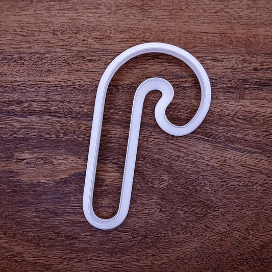 Holiday Candy Cane Cookie Cutter available in 1.5" to 7". Optional stamp adds stripe details for Christmas cookies, gifts, and fun family baking activities.