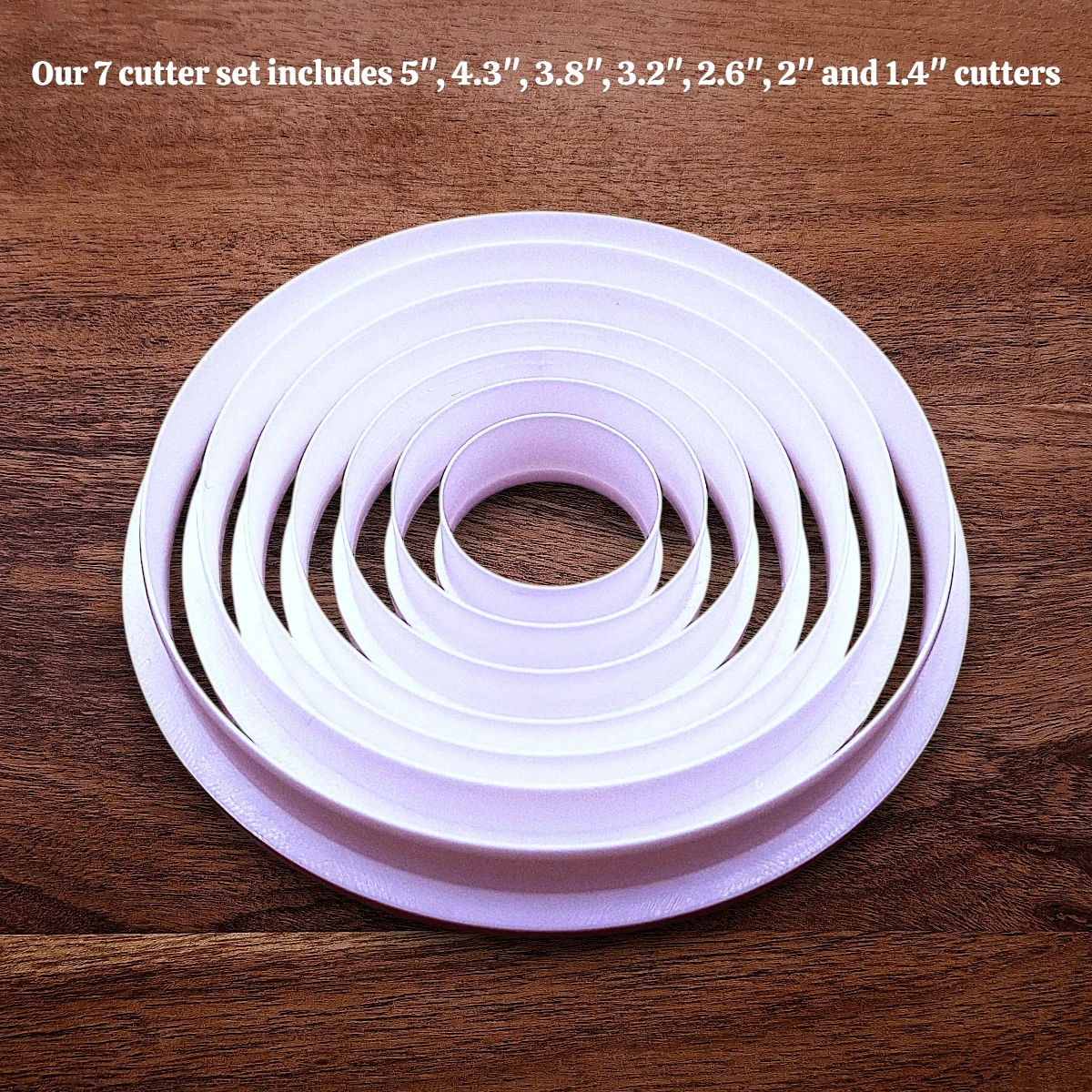Set of 7 customizable circle cookie cutters from 5" to 1.4". Perfect for baking, fondant, biscuits, sandwiches, and crafting round shapes.