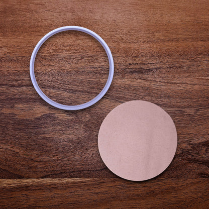 Round circle cookie cutter for baking, fondant, and crafts beside a circle dough cutout. Handmade circular tool available in multiple sizes for perfect shapes