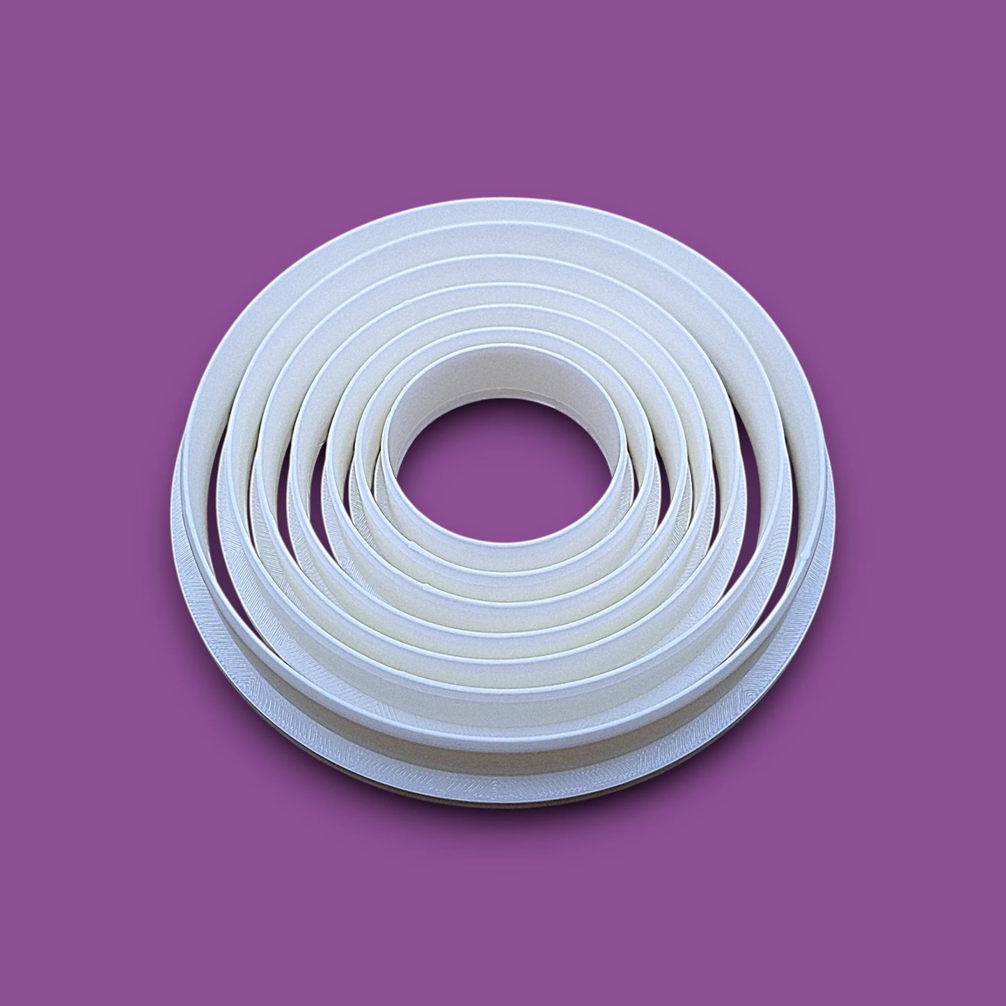 Set of 7 customizable circle cookie cutters from 5" to 1.4". Perfect for baking, fondant, biscuits, sandwiches, and crafting round shapes.