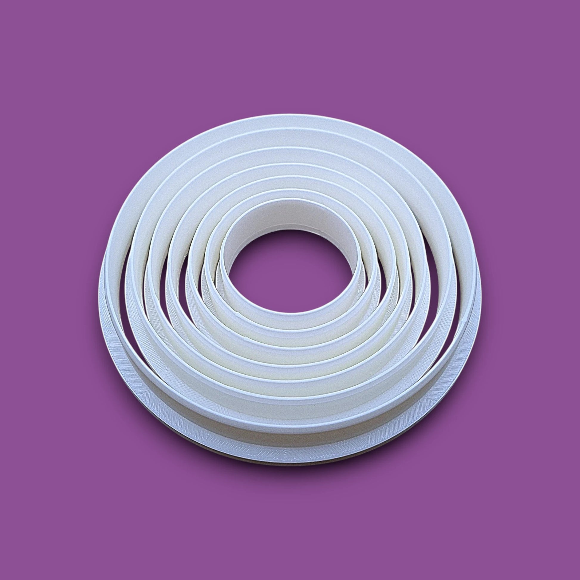 Set of 7 customizable circle cookie cutters from 5" to 1.4". Perfect for baking, fondant, biscuits, sandwiches, and crafting round shapes.