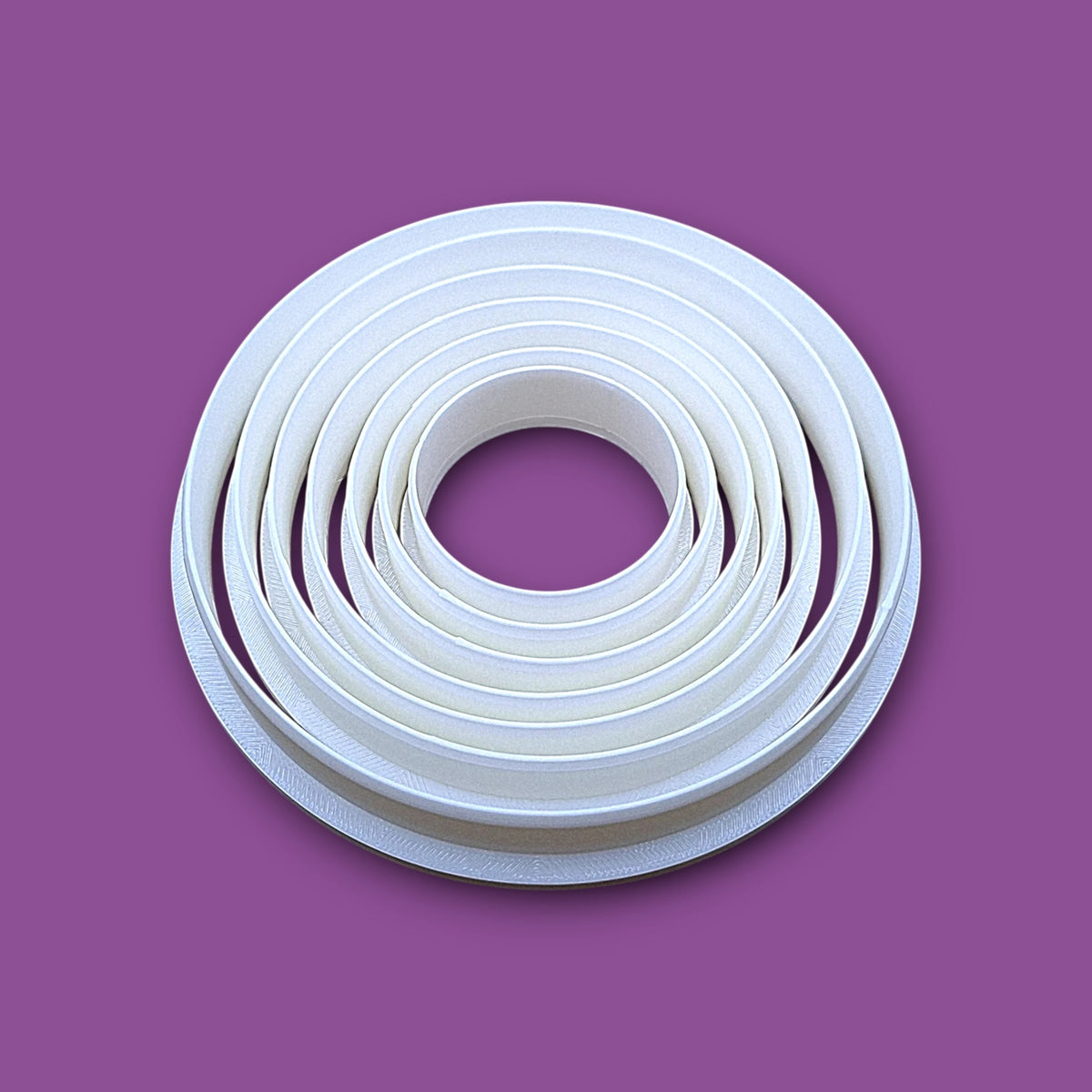 Set of 7 customizable circle cookie cutters from 5" to 1.4". Perfect for baking, fondant, biscuits, sandwiches, and crafting round shapes.