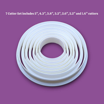 Set of 7 circle cookie cutters from 5" to 1.4". Perfect for baking, fondant, biscuits, sandwiches, and crafting round shapes.