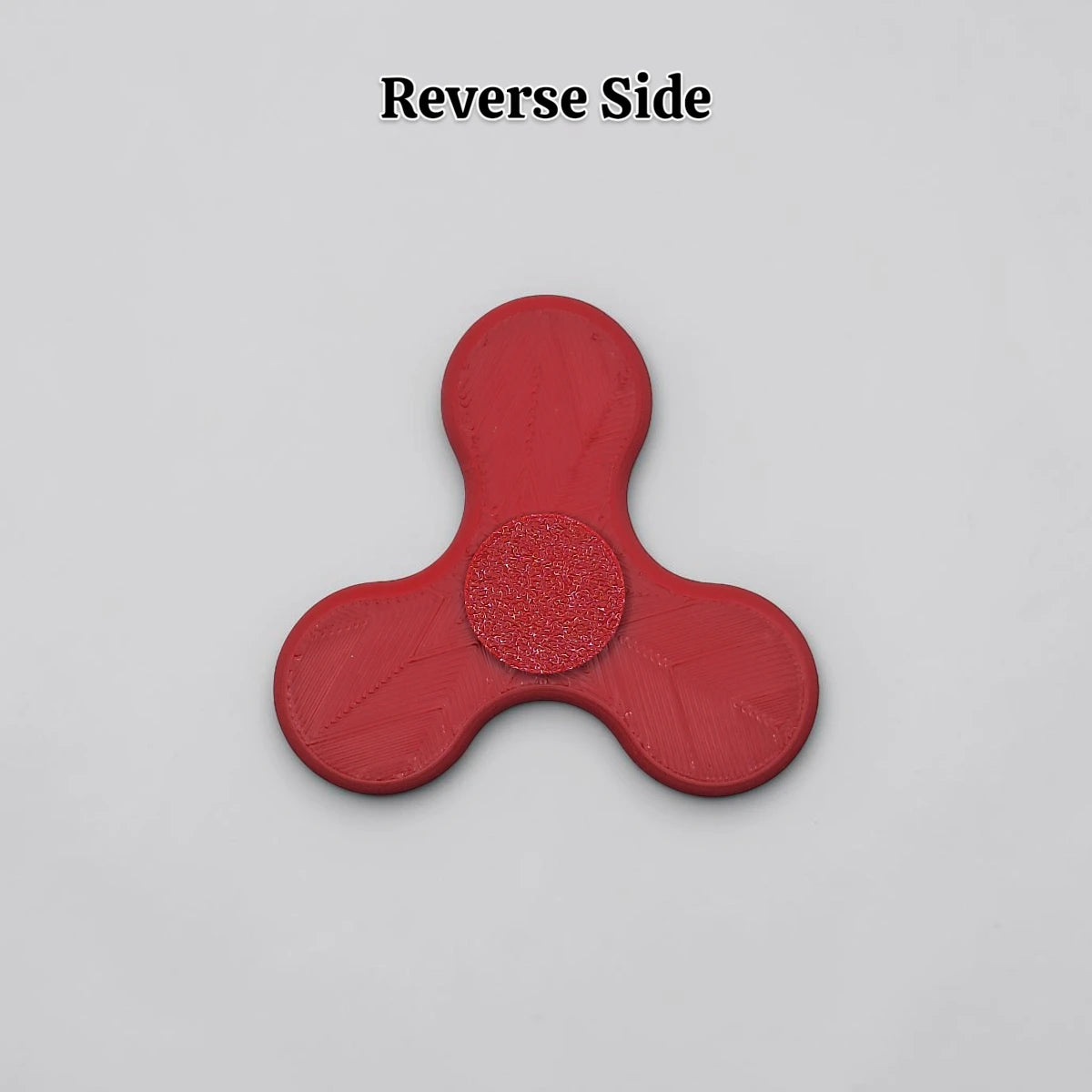 Reverse side of fidget spinner in red, perfect for party favors, birthday gifts and classroom rewards. Customizable in 30 unique colors.
