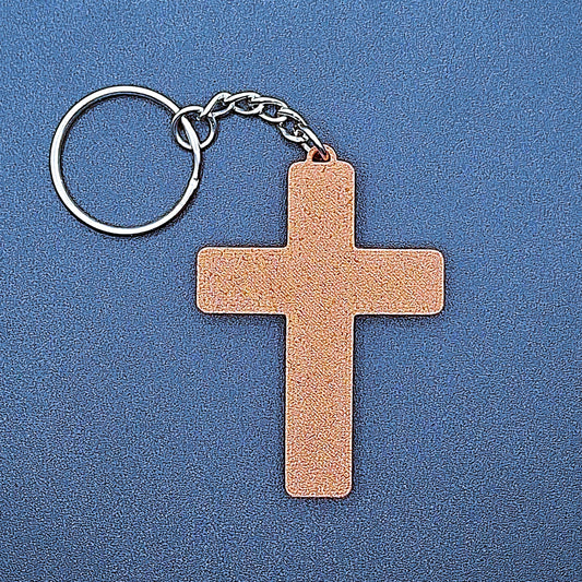 Front view of a brown cross keychain, eco-friendly and handcrafted, ideal for faith-based gifts, church events, and meaningful everyday accessories.