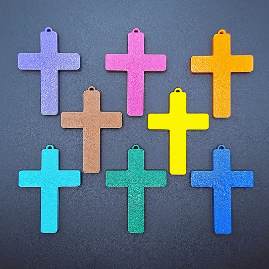Front view of eight vibrant cross keychains, eco-friendly and handmade, ideal for VBS, church events, and meaningful faith-based gifts.