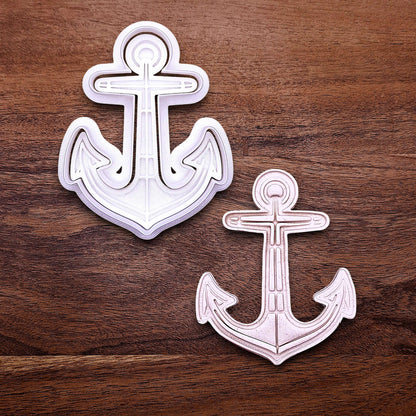 Anchor cookie cutter with matching stamp and dough cutout. Ideal for making detailed cookies, fondant toppers, or ocean party treats.