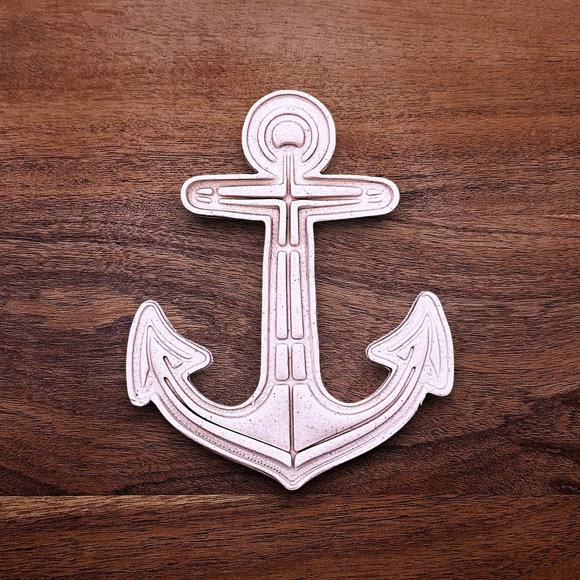 Anchor cookie dough cutout with stamped detail. Perfect for beach-themed cookies, nautical parties, weddings, or ocean-inspired bakes.