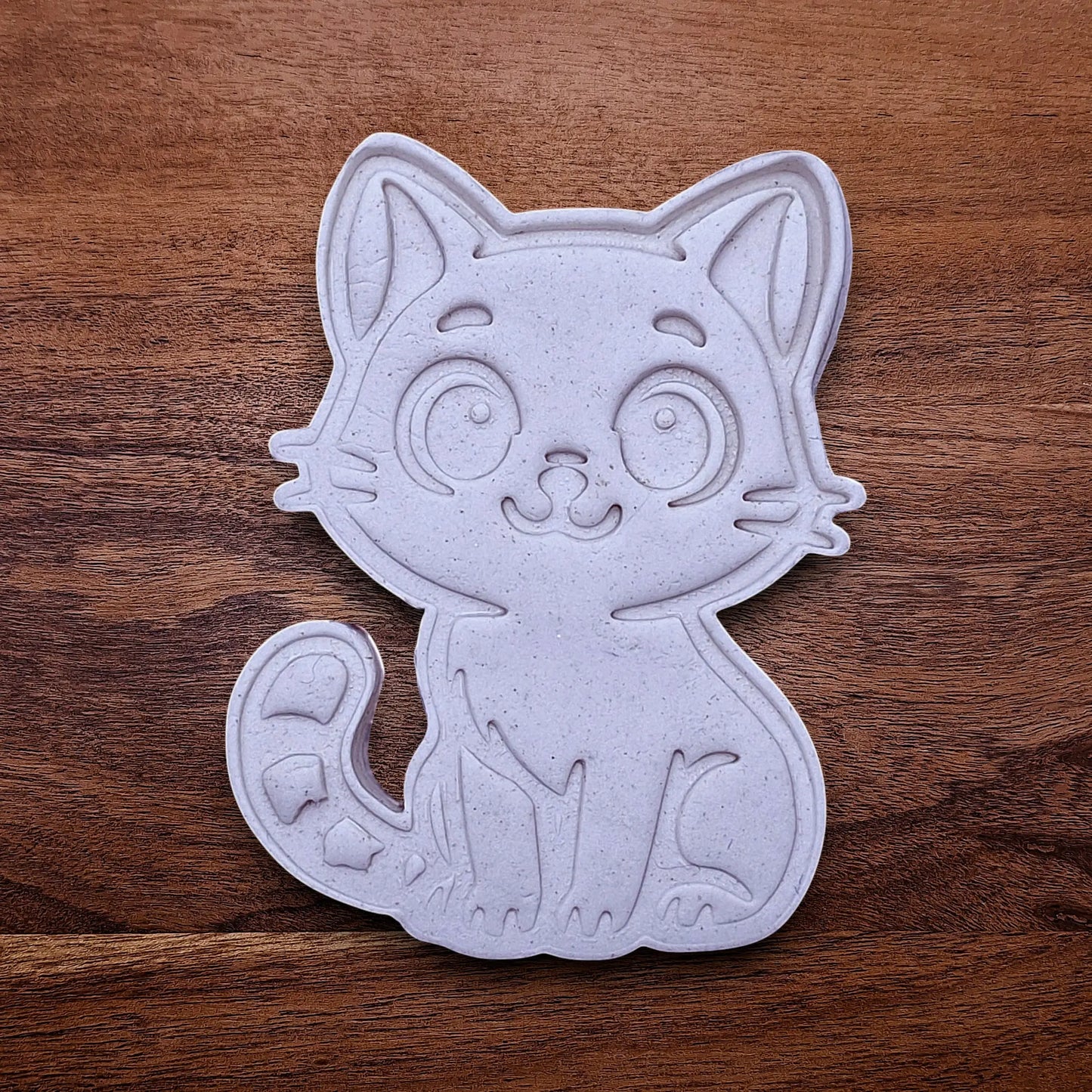 Customizable cat cookie dough cutout and imprint, perfect for kitty cookie designs, fondant toppers, birthday parties, crafts or cat themed baking projects.