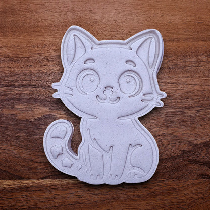 Customizable cat cookie dough cutout and imprint, perfect for kitty cookie designs, fondant toppers, birthday parties, crafts or cat themed baking projects.