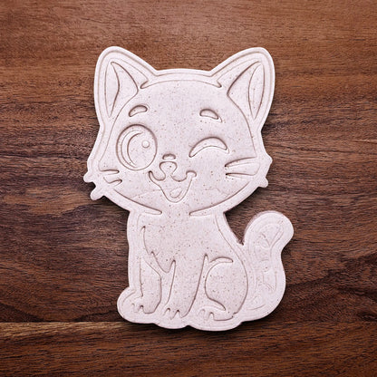 Winking cat customizable cookie cutter dough cutout and imprint, great for creating detailed, cat-themed cookies, fondant pieces, or party treats for birthdays, parties and craft projects.