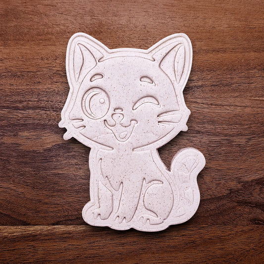 Winking cat customizable cookie cutter dough cutout and imprint, great for creating detailed, cat-themed cookies, fondant pieces, or party treats for birthdays, parties and craft projects.