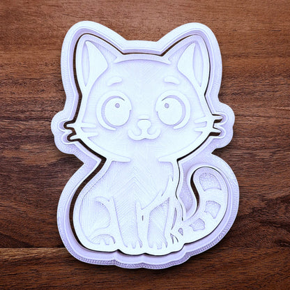 Customizable cat cookie cutter and stamp, perfect for kitty cookie designs, fondant toppers, birthday parties, crafts or cat themed baking projects.