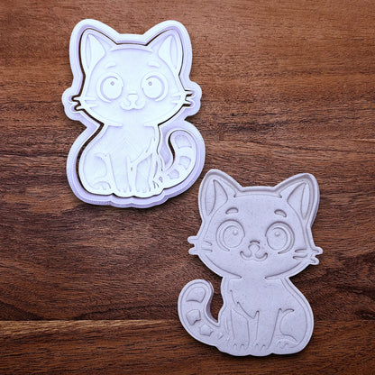 Customizable cat cookie cutter and stamp alongside a cat dough cutout and imprint, perfect for kitty cookie designs, fondant toppers, birthday parties, crafts or cat themed baking projects.