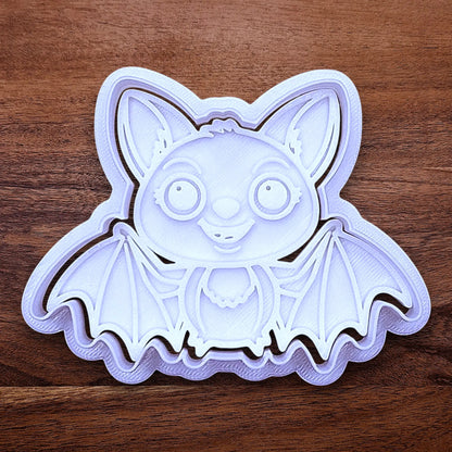 Cute bat cookie cutter with stamp - adds cute Halloween charm. Complete with cute details for whimsical baking, parties, or spooky gifting. Handmade and customizable in 30 colors.