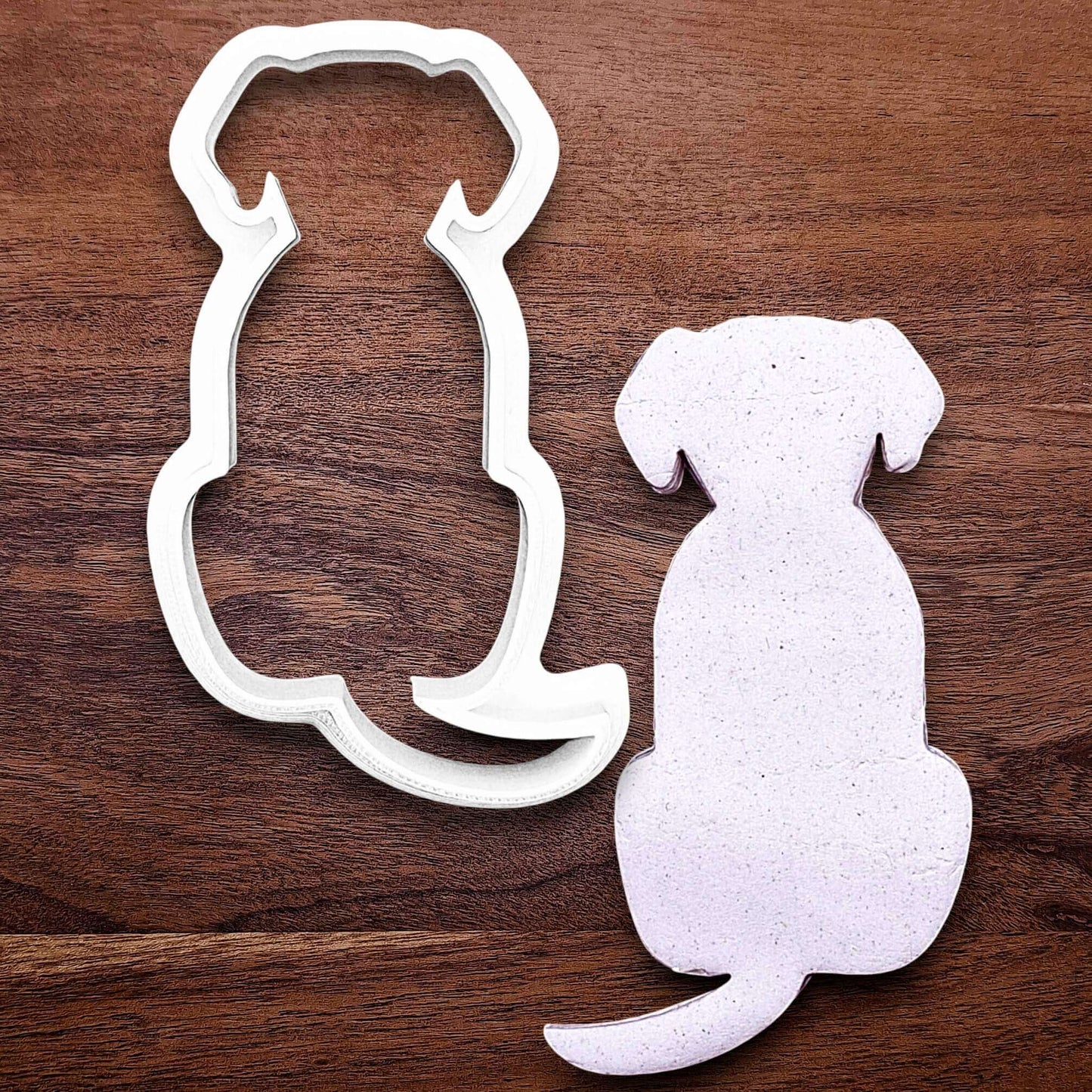 Dog-shaped cookie cutter with dough cutout, perfect for pet-themed treats, parties, or homemade dog cookies – eco-friendly and handmade.