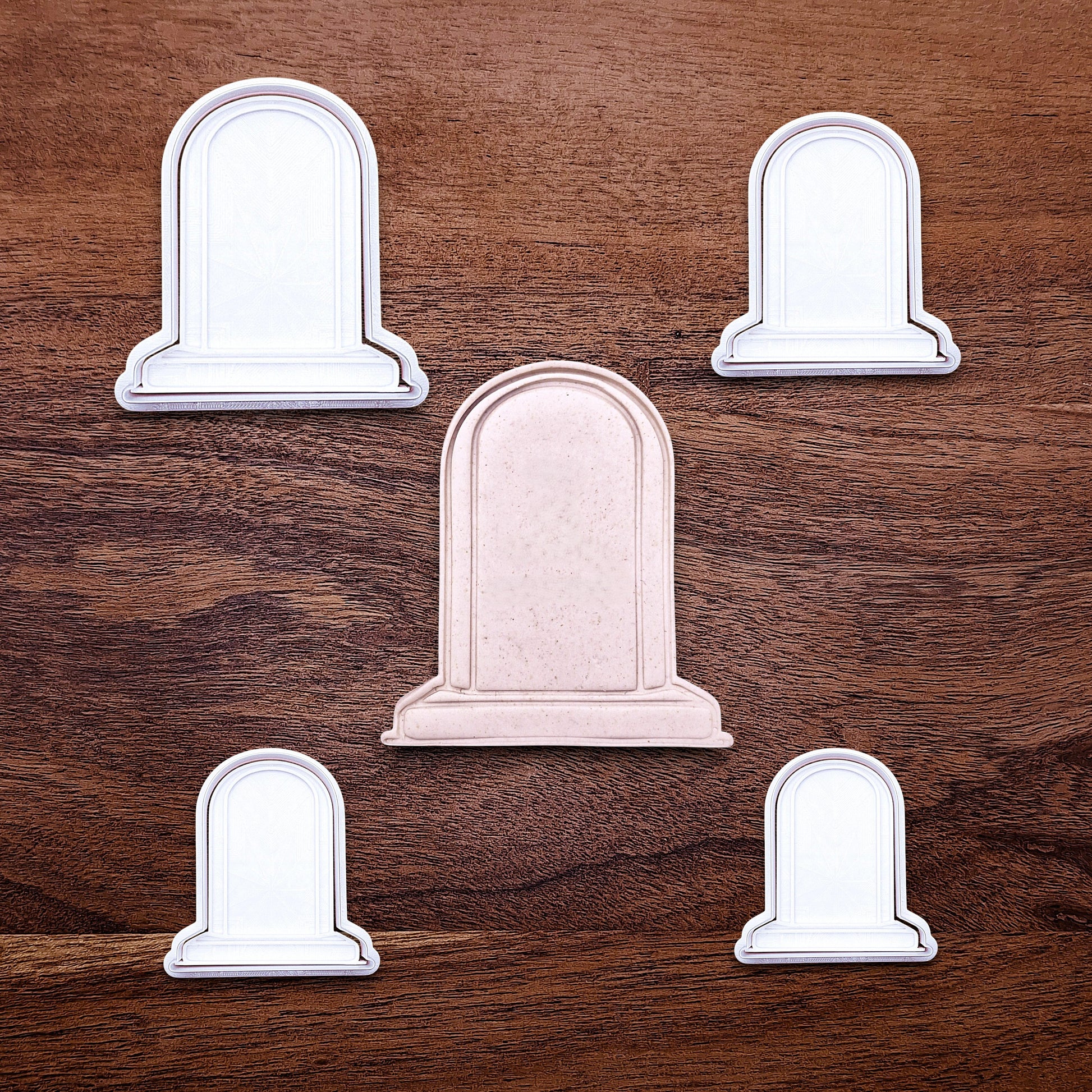 Gravestone cookie cutters with stamps for Halloween treats and spooky desserts, adds detail to dough, fondant, and craft projects.