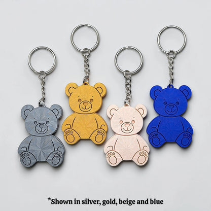 Teddy bear keychains in assorted colors - handmade eco-friendly charms perfect for kids, baby showers, party favors, or animal-themed gifts.