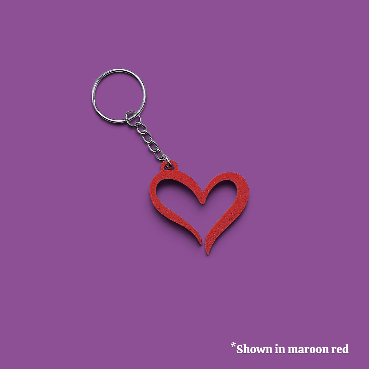 Handmade and customizable heart keychain in red, perfect for Valentine's Day, party favors, baby showers, or everyday gifts.