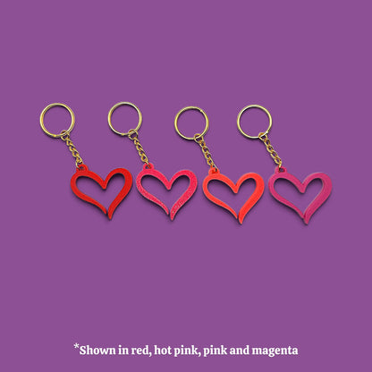 Handmade and customizable heart keychains in unique colors, perfect for Valentine's Day, party favors, baby showers, or everyday gifts.