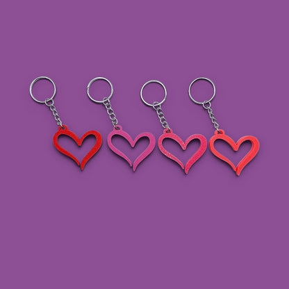 Handmade and customizable heart keychains, perfect for Valentine's Day, party favors, baby showers, or everyday gifts.