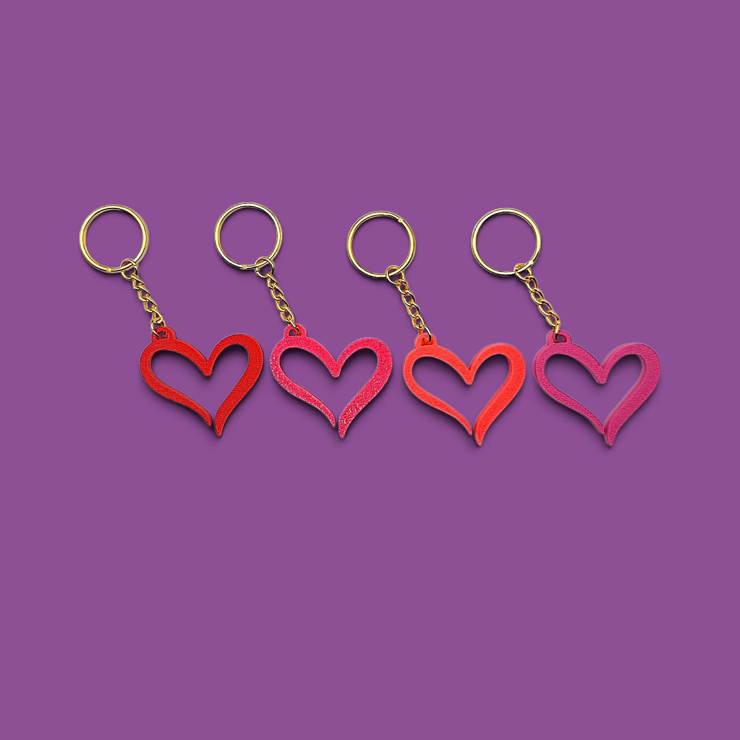 Handmade and customizable heart keychains with gold keyring, perfect for Valentine's Day, party favors, baby showers, or everyday gifts.