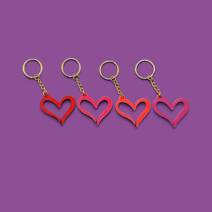 Handmade and customizable heart keychains with gold keyring, perfect for Valentine's Day, party favors, baby showers, or everyday gifts.