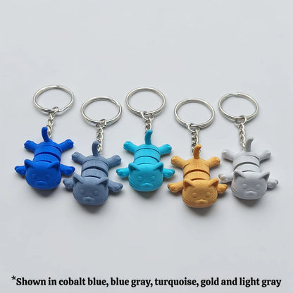 Cat keychains in assorted colors , customizable and handmade, perfect for classroom prizes, party favors and event giveaways.