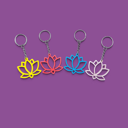 Lotus flower keychains shown in various vibrant colors, eco-friendly and handmade, perfect for spiritual gifts or mindful accessories.