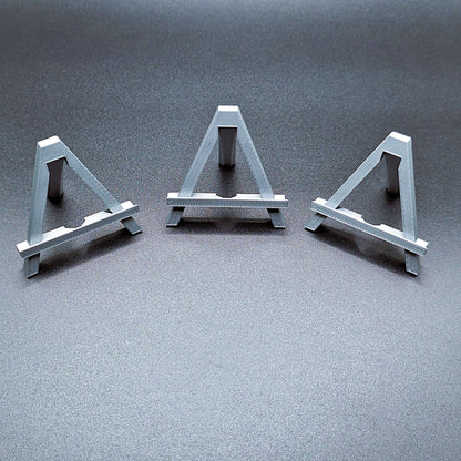 Mini foldable easels in silver – sleek and portable display stands ideal for showcasing artwork, signs, photos, or merchandise at craft fairs, shops, and events.