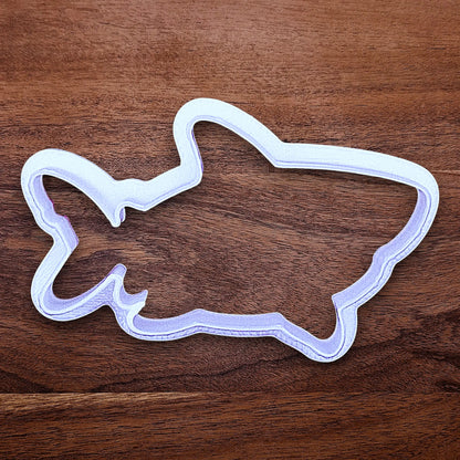Customizable ocean shark cookie cutter, creates standout ocean cookies with charming face and fin details, perfect for themed birthdays, baby showers, and beach parties.