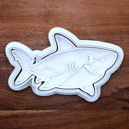 Customizable ocean shark cookie cutter and stamp, creates standout ocean cookies with charming face and fin details, perfect for themed birthdays, baby showers, and beach parties.