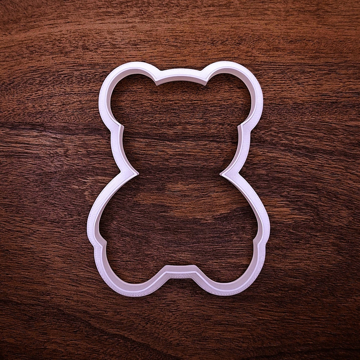 Teddy bear cookie cutter made from food-safe, eco-friendly plastic—perfect for kid-friendly baking, baby showers, and themed desserts.