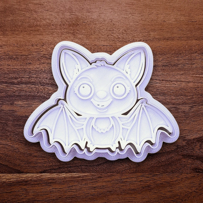 Cute bat cookie cutter with stamp - adds cute Halloween charm. Complete with cute details for whimsical baking, parties, or spooky gifting. Handmade and customizable in 30 colors.