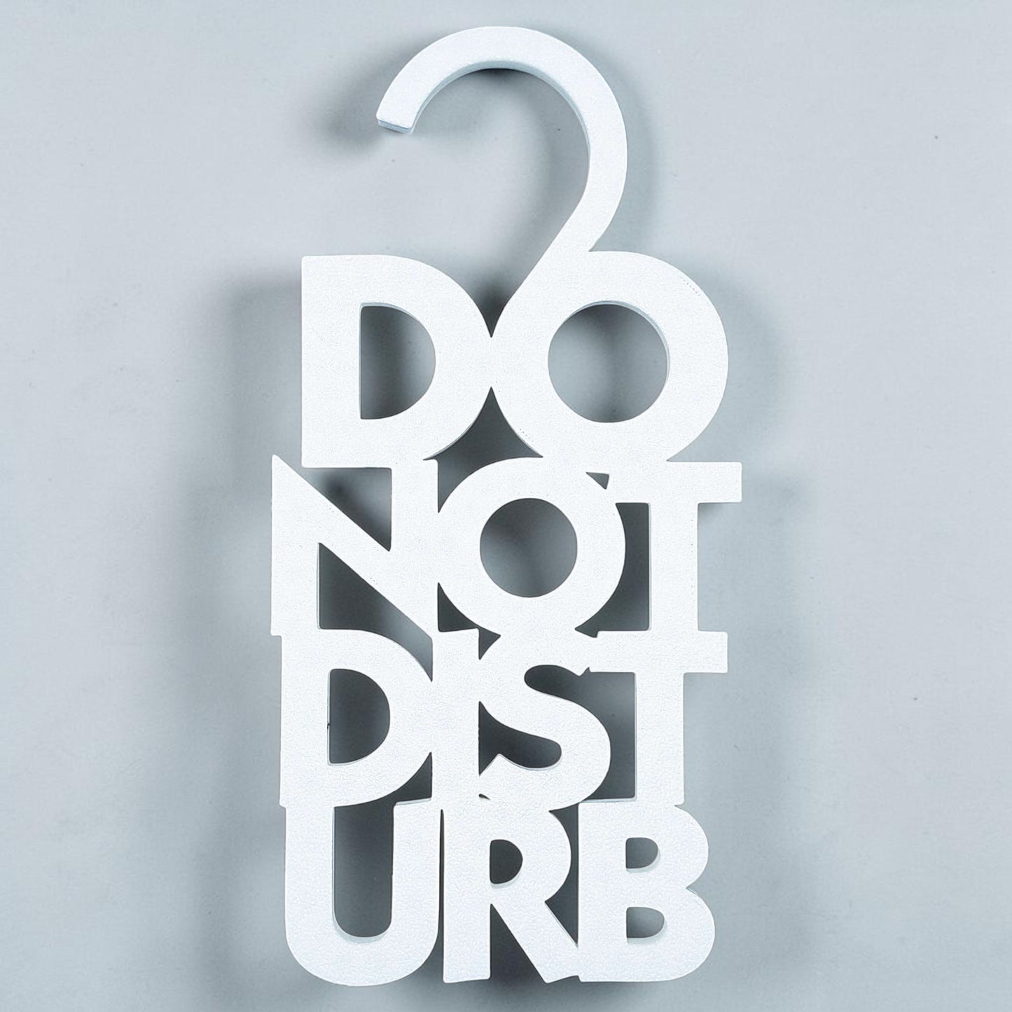 White Do Not Disturb hanger with clean, modern black text—perfect minimalist sign for professional or personal use to block unwanted interruptions.