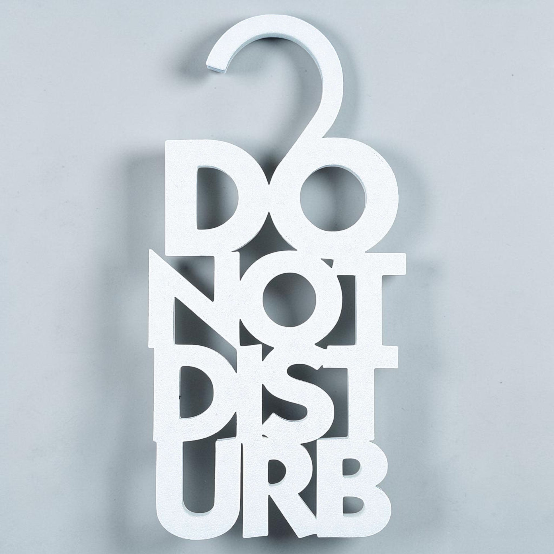 White Do Not Disturb hanger with clean, modern black text—perfect minimalist sign for professional or personal use to block unwanted interruptions.