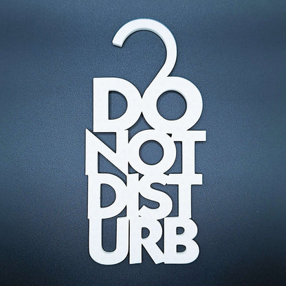 White Do Not Disturb hanger with clean, modern black text—perfect minimalist sign for professional or personal use to block unwanted interruptions.
