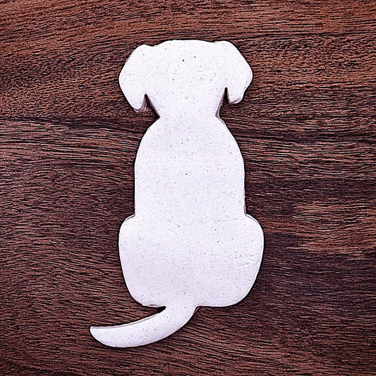 Dog-shaped cookie cutter with dough cutout on baking surface, perfect for pet-themed treats, parties, or homemade dog cookies – eco-friendly and handmade.