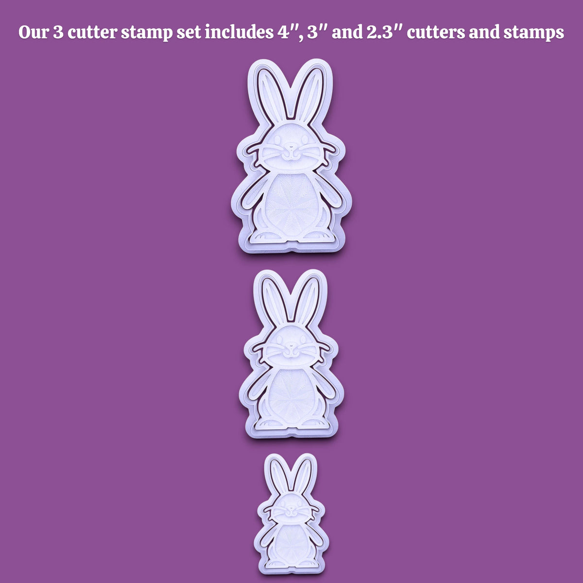 Three bunny-shaped cookie cutters and stamps shown in descending size order on a solid purple background, with white text at the top stating 'Our 3 cutter stamp set includes 4", 3", and 2.3" cutters and stamps'.