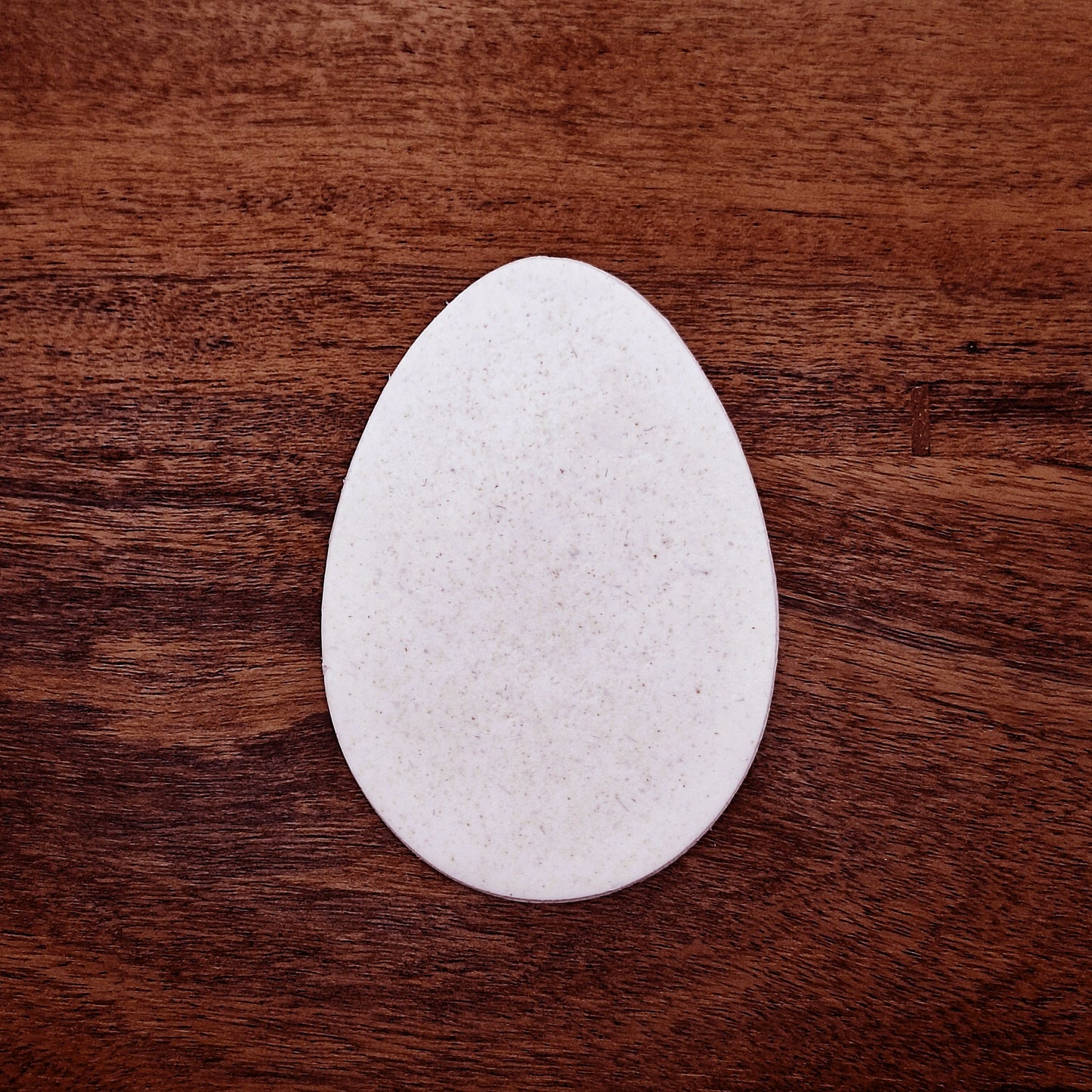 Round dough cutout made with Easter egg cookie cutter—perfect for spring baking, decorating, and Easter basket treats.