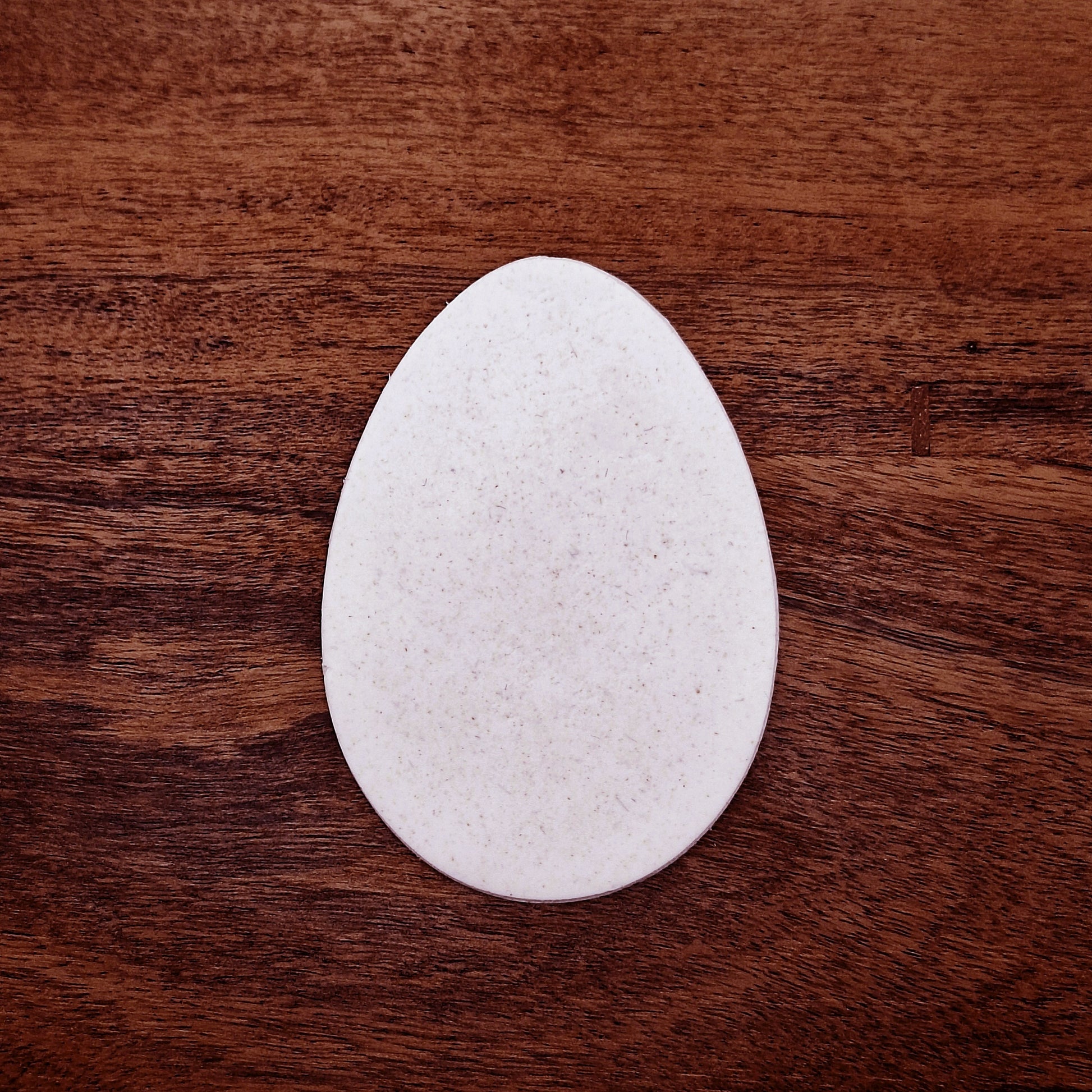 Round dough cutout made with Easter egg cookie cutter—perfect for spring baking, decorating, and Easter basket treats.