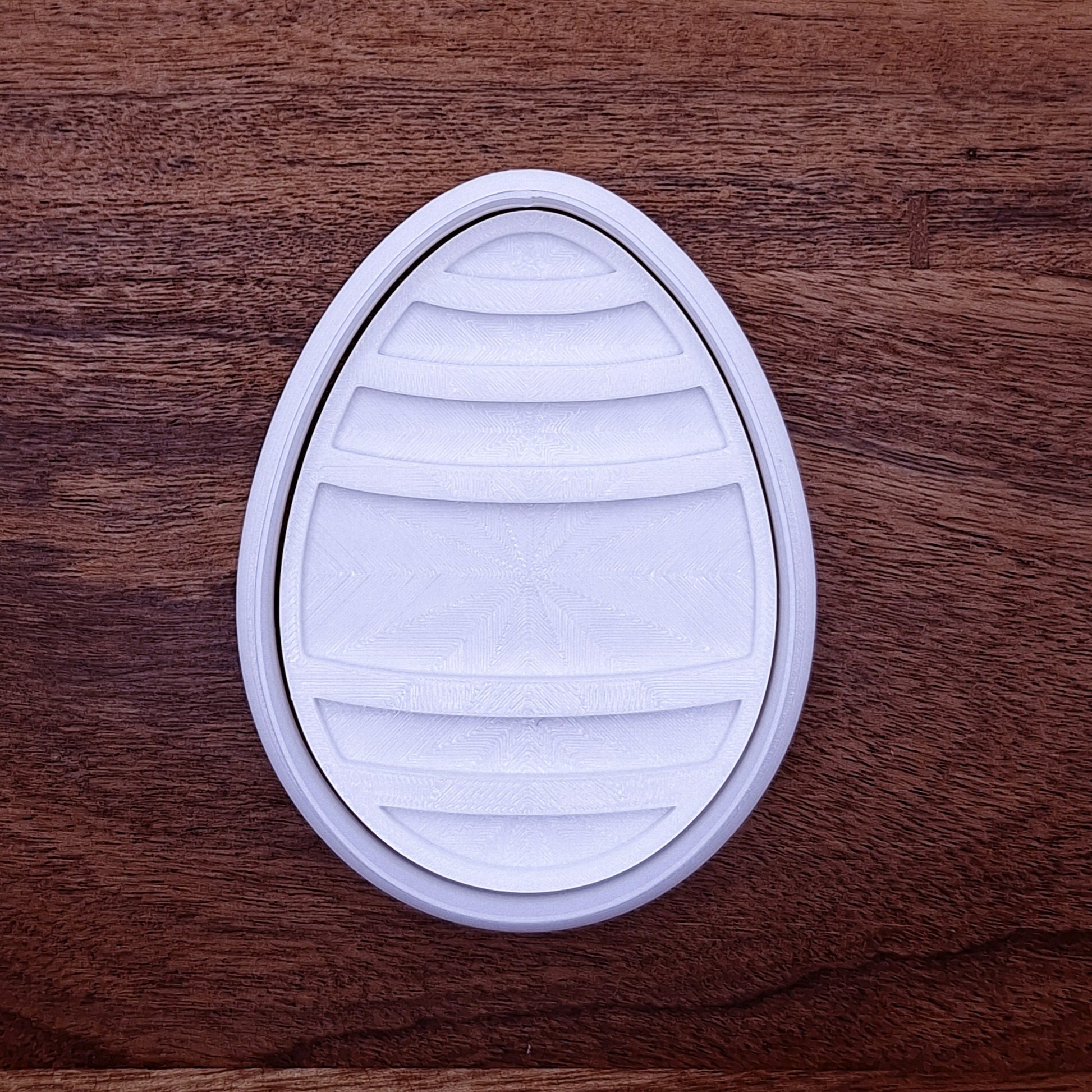 Customizable Easter egg cookie cutter—choose size and color, from 2" to 7", with or without a stamp for easy spring baking.