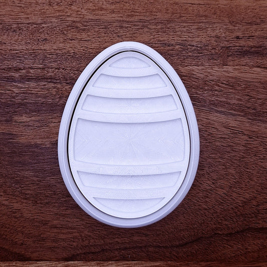 Customizable Easter egg cookie cutter—choose size and color, from 2" to 7", with or without a stamp for easy spring baking.